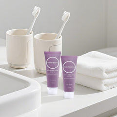 RSQAZQ lotion close-up shows fast absorption and non-greasy feel.