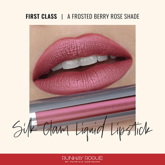 Runway Rogue First Class shade swatch on lips reveals frosted berry-rose glow.
