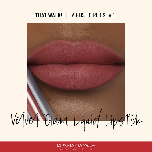 Runway Rogue Velvet Glam That Walk swatch on arm shows rustic red shade.