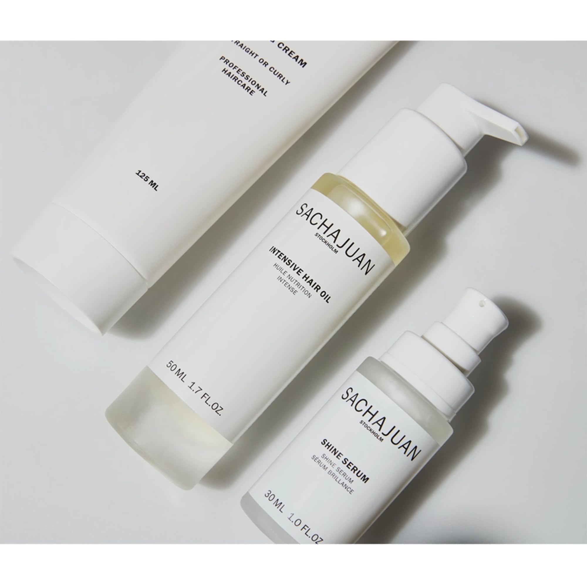SACHAJUAN Shine Serum texture on hair, highlighting a light-reflecting sheen.
