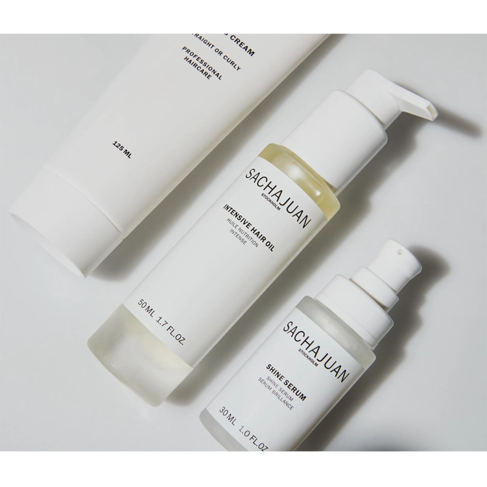 SACHAJUAN Shine Serum texture on hair, highlighting a light-reflecting sheen.