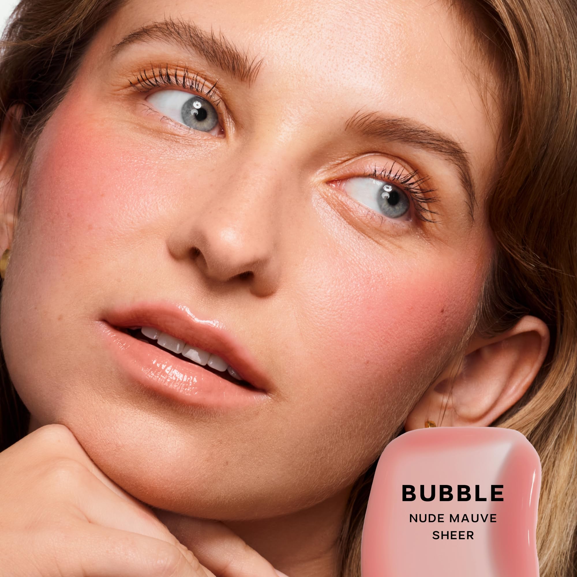 Saie Glossybounce Bubble applicator dots for precise, buildable color.