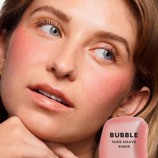 Saie Glossybounce Bubble applicator dots for precise, buildable color.