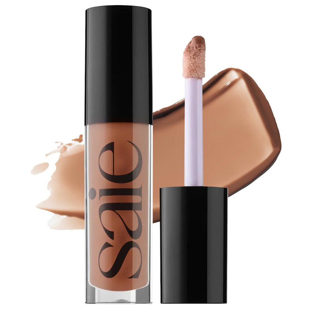 Saie Glossybounce hydrating lip gloss on lips with luminous shine