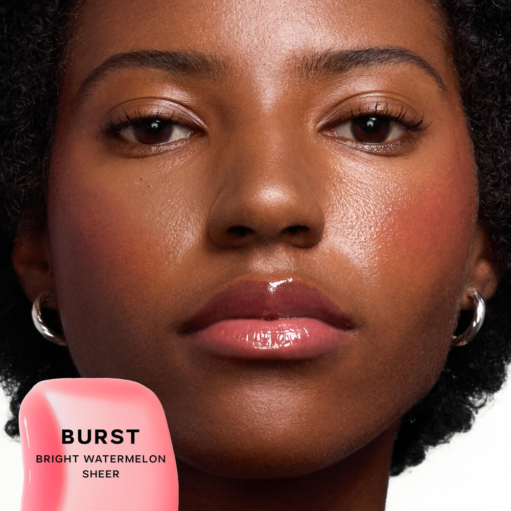 Saie Glossybounce tube cap close-up highlighting travel-ready design.