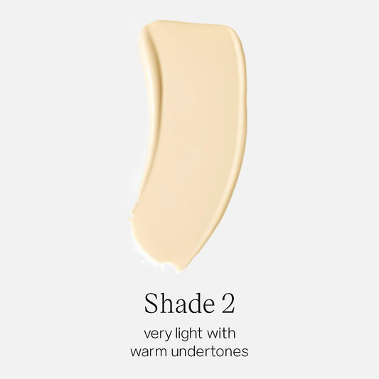 Saie Glowy Super Skin Tint being pumped to reveal a light, luminous finish.