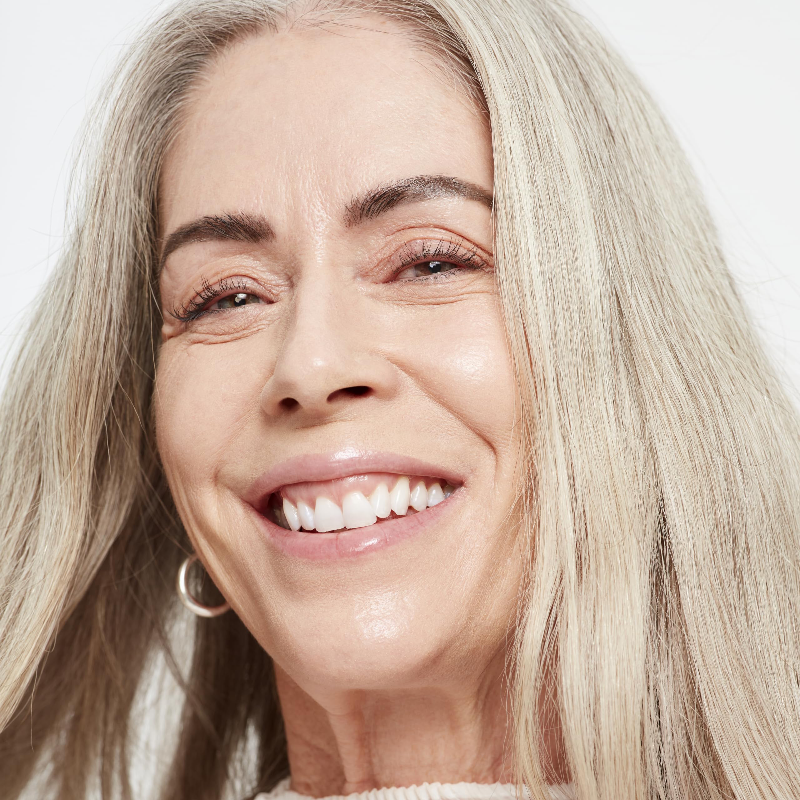Saie packaging close-up highlighting vegan, dermatologist-tested formula for sensitive skin.
