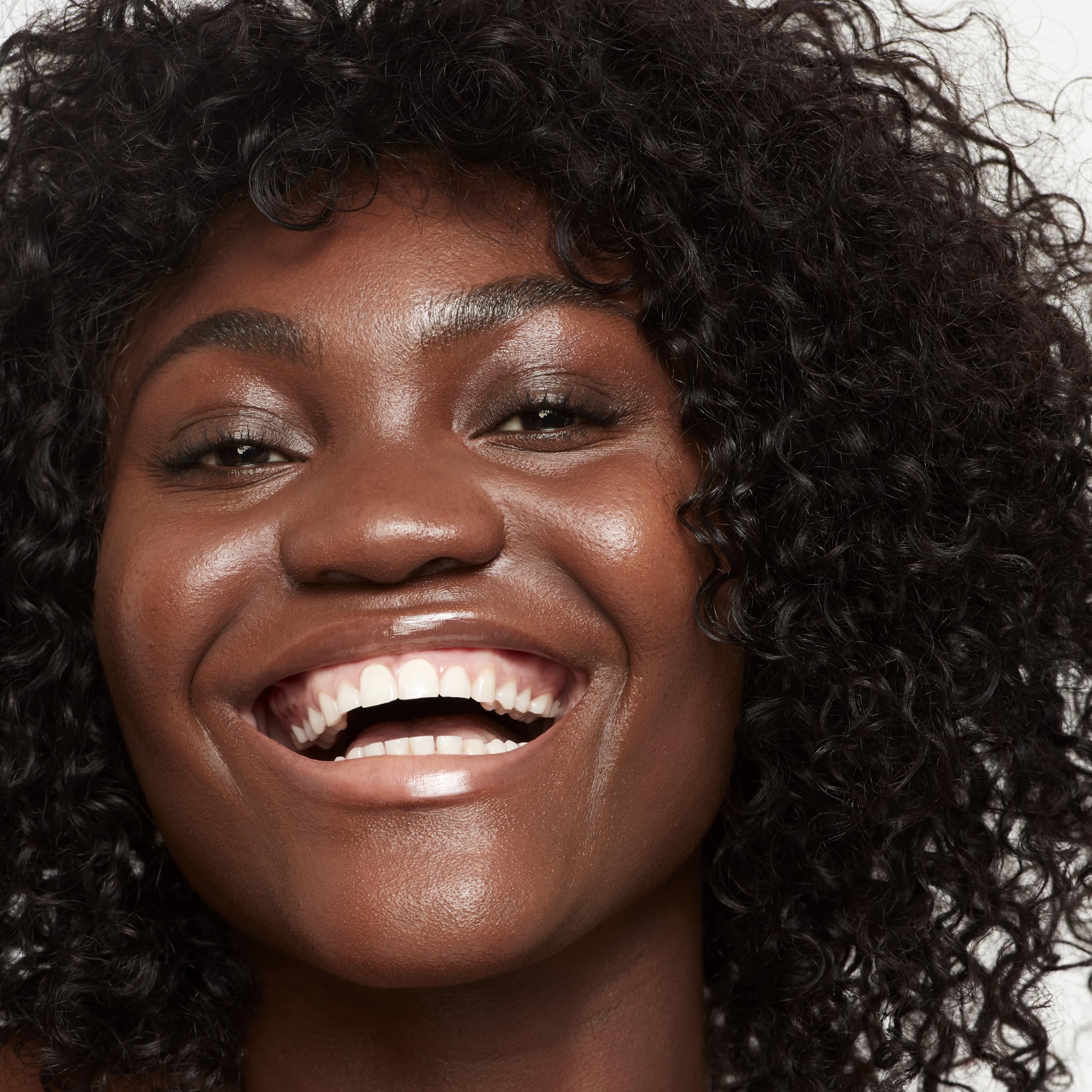 Saie Glowy Super Skin Tint pump demonstrates easy, mess-free application.