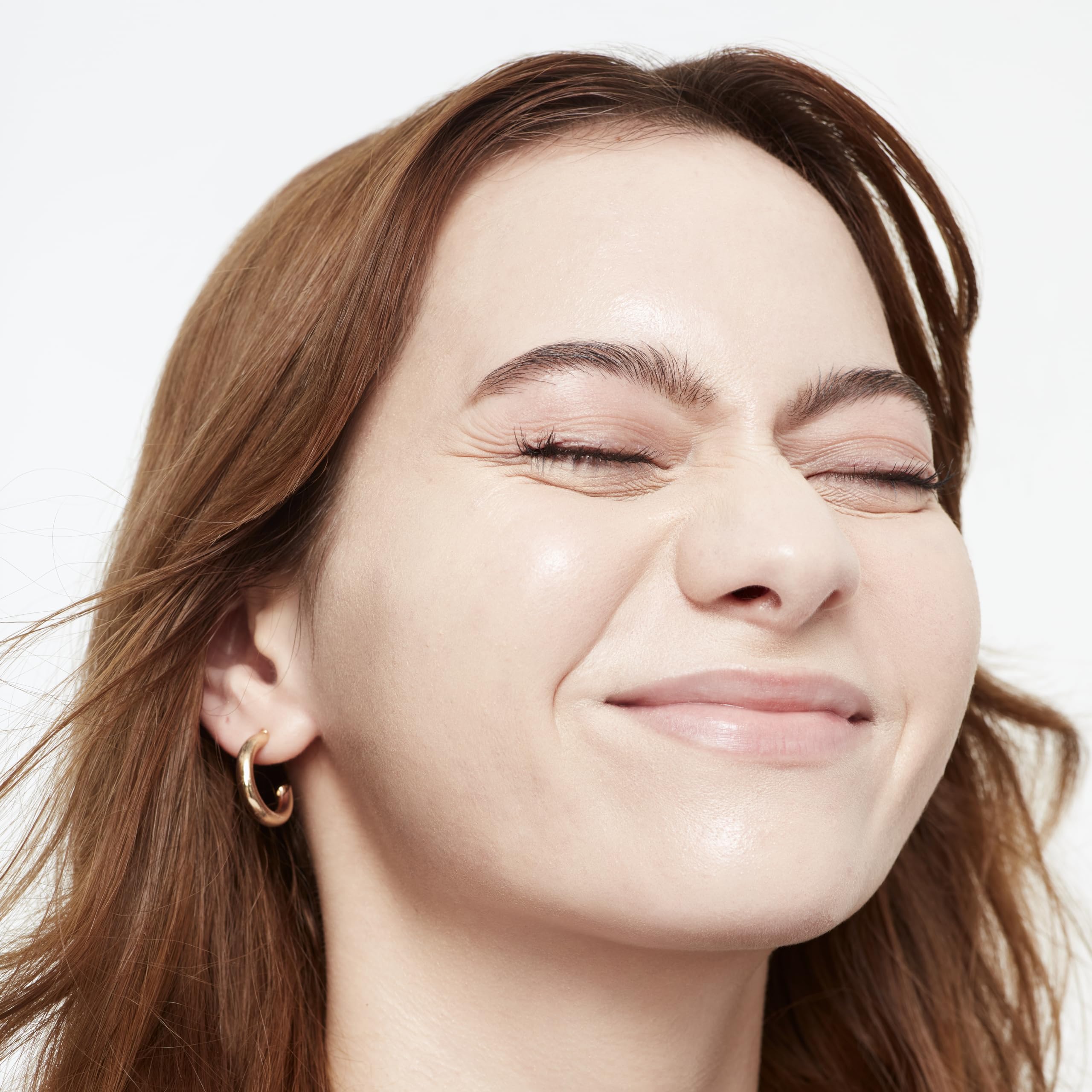 Shade 2 swatch on warm-toned Saie Glowy Super Skin Tint.