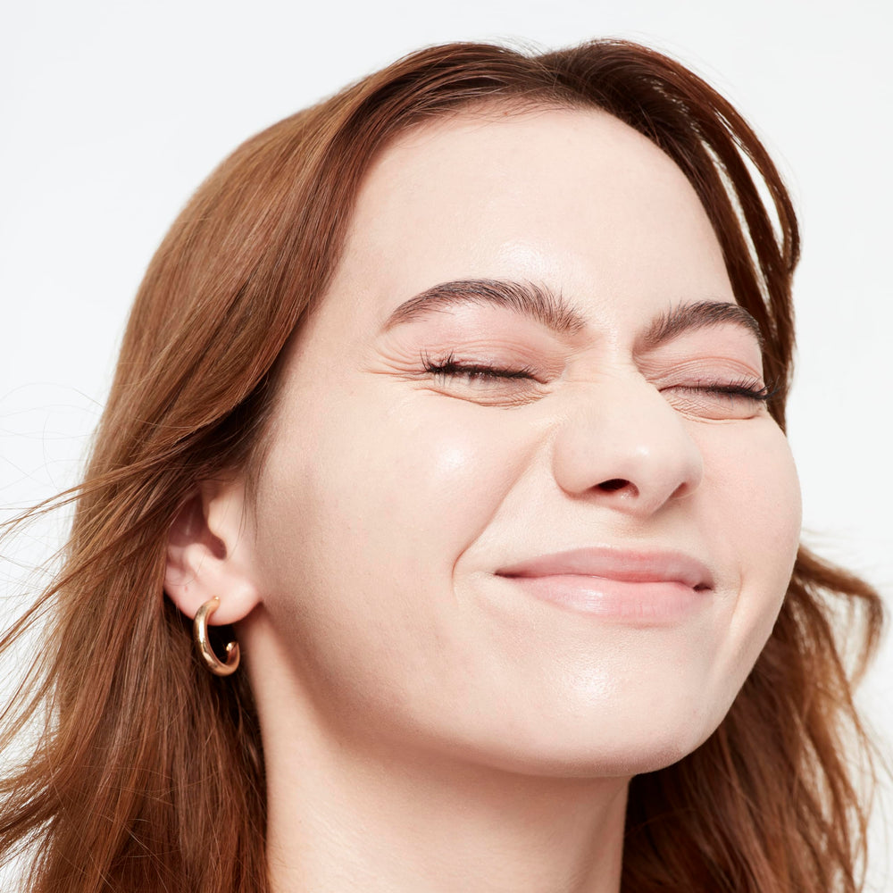 Shade 2 swatch on warm-toned Saie Glowy Super Skin Tint.