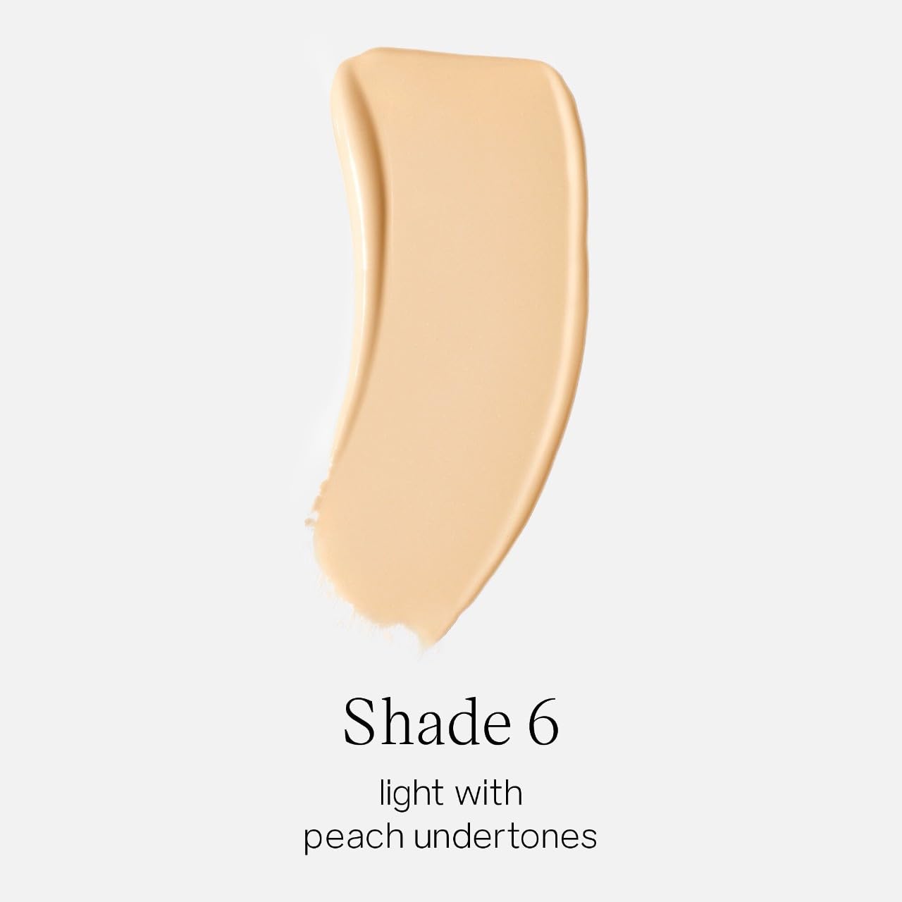 Saie Glowy Super Skin Tint Shade 6 swatch shows peach undertones for light skin.