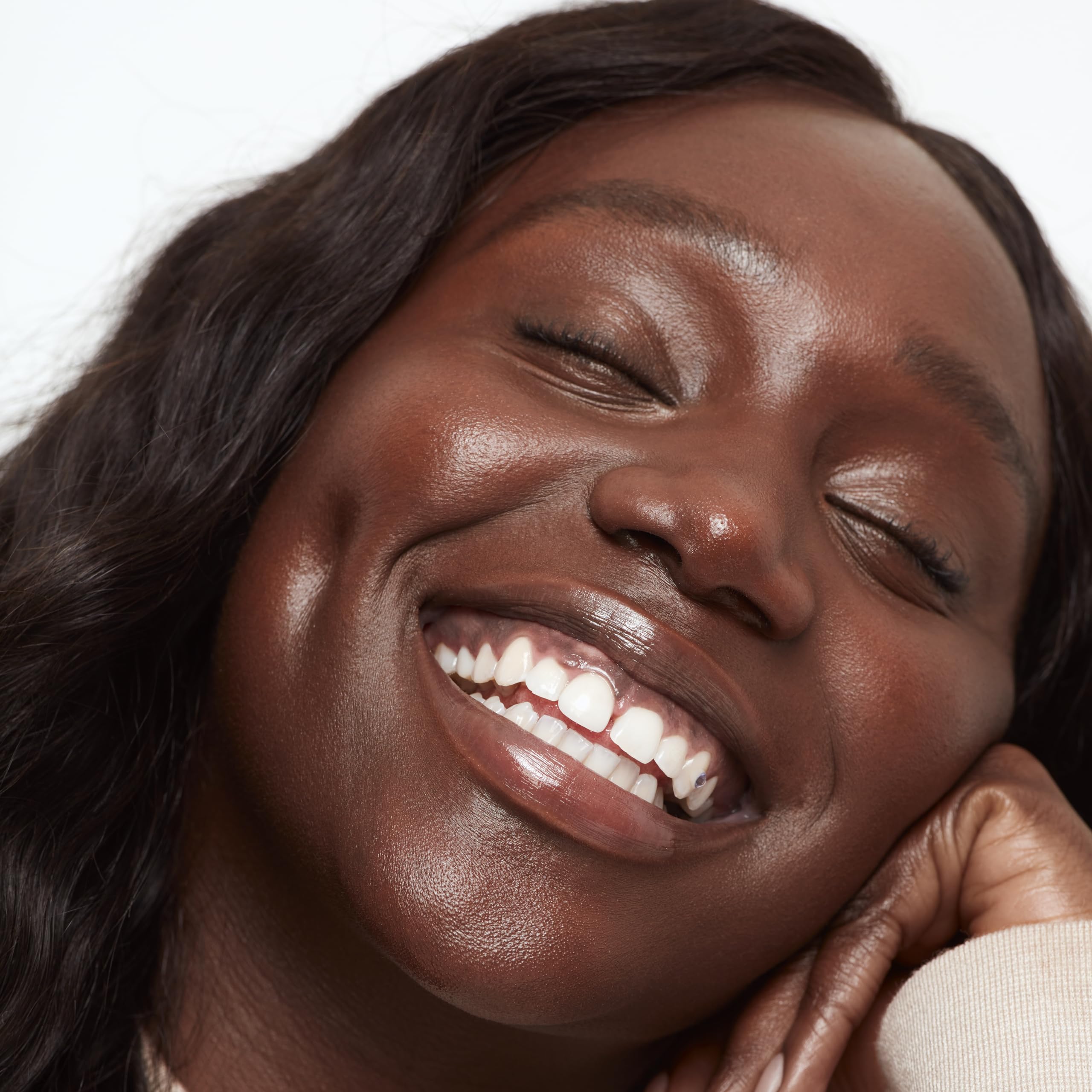 Saie Glowy Super Skin Tint swirl activation image highlights seamless skin-like finish.