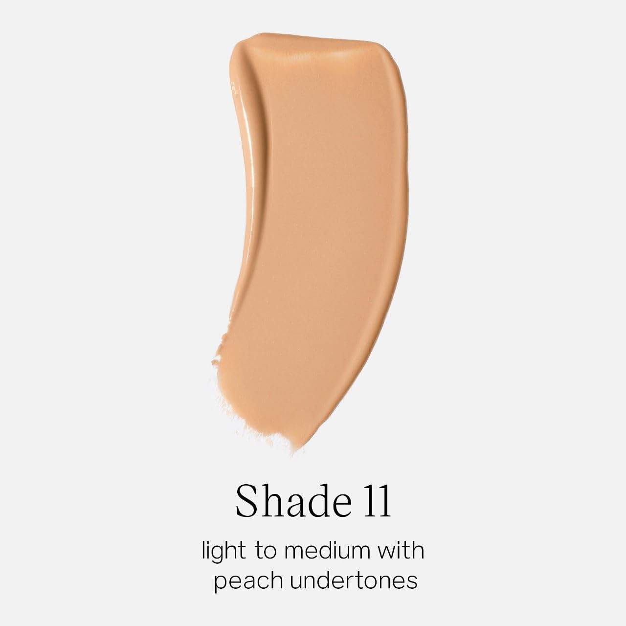 Texture swirl of Saie Glowy Super Skin Tint on skin for seamless coverage.