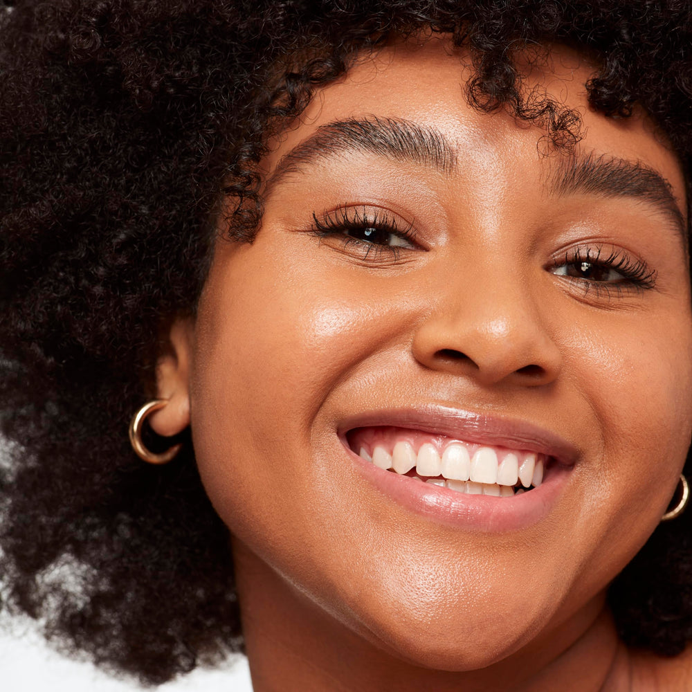 Saie Glowy Super Skin Tint swirl texture reveals radiant, skin-like glow.