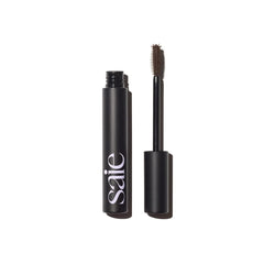 Saie Mascara 101 brown bottle close-up showing lengthening lashes