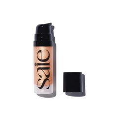 Saie Mini Glowy Super Gel bottle demonstrates hydration-ready glow.