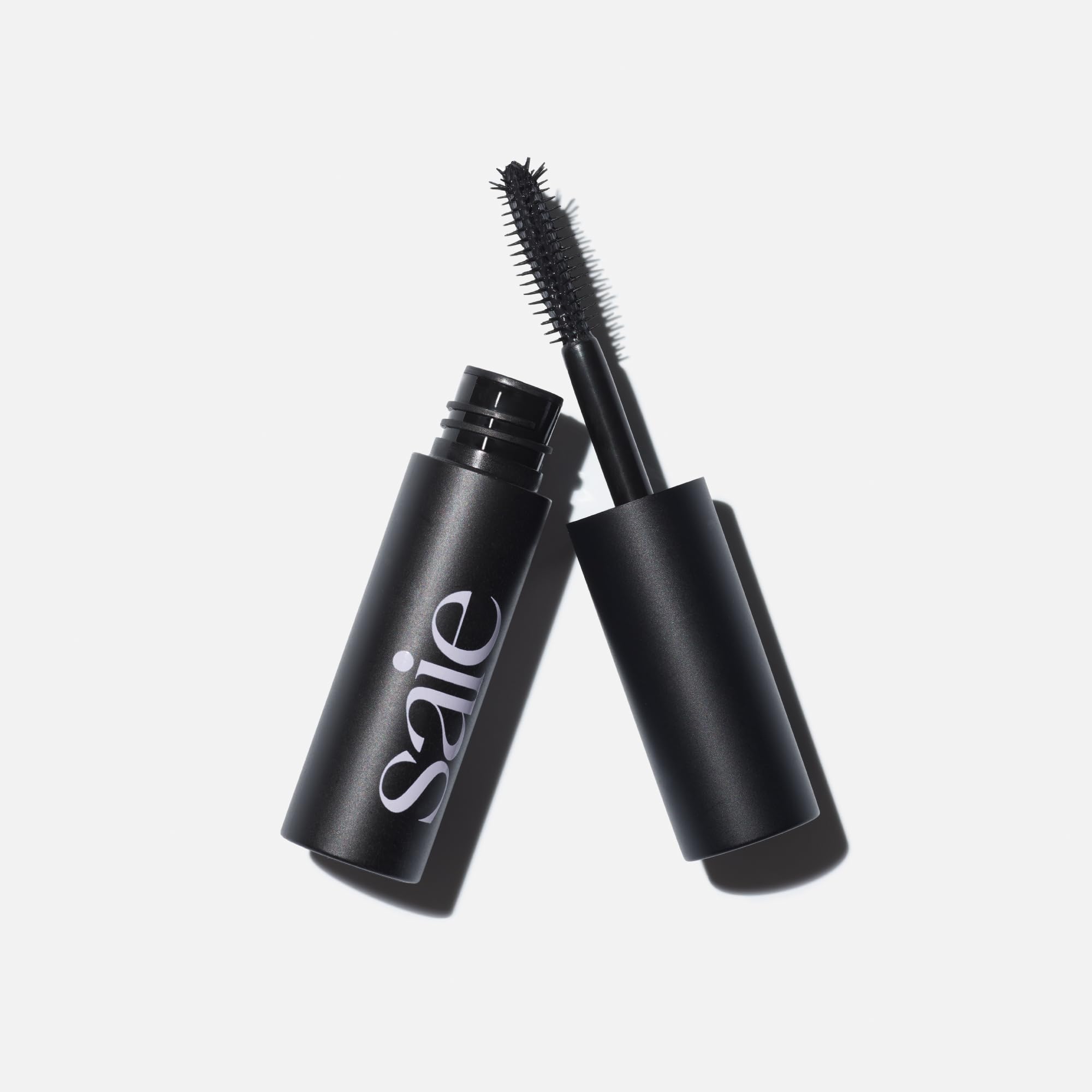 Saie Mini Mascara101 close-up bottle highlights conditioning formula.