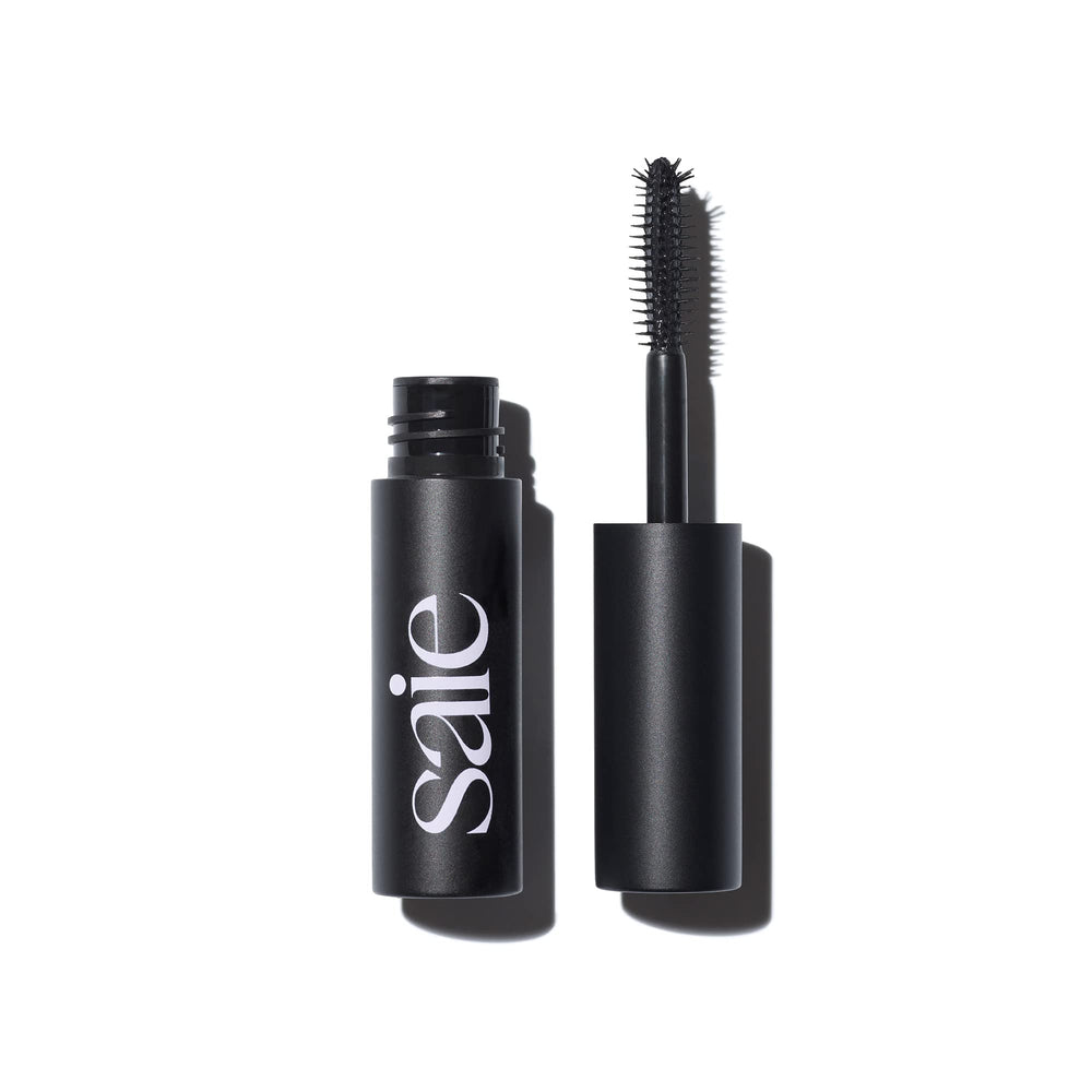 Saie Mini Mascara101 wand at base lifts lashes for natural length.