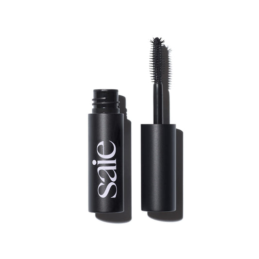 Saie Mini Mascara101 wand at base lifts lashes for natural length.