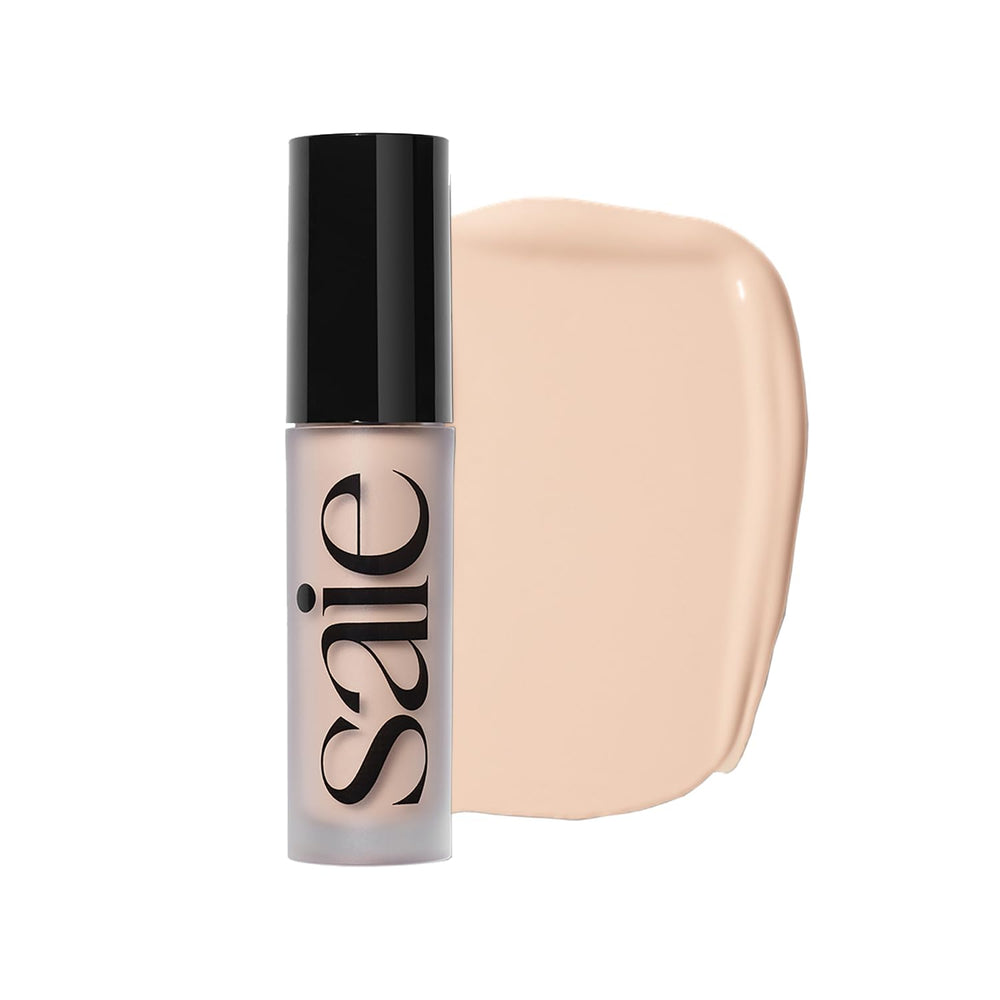 This close-up shows Saie Slip Tint concealer tube for natural, radiant coverage.