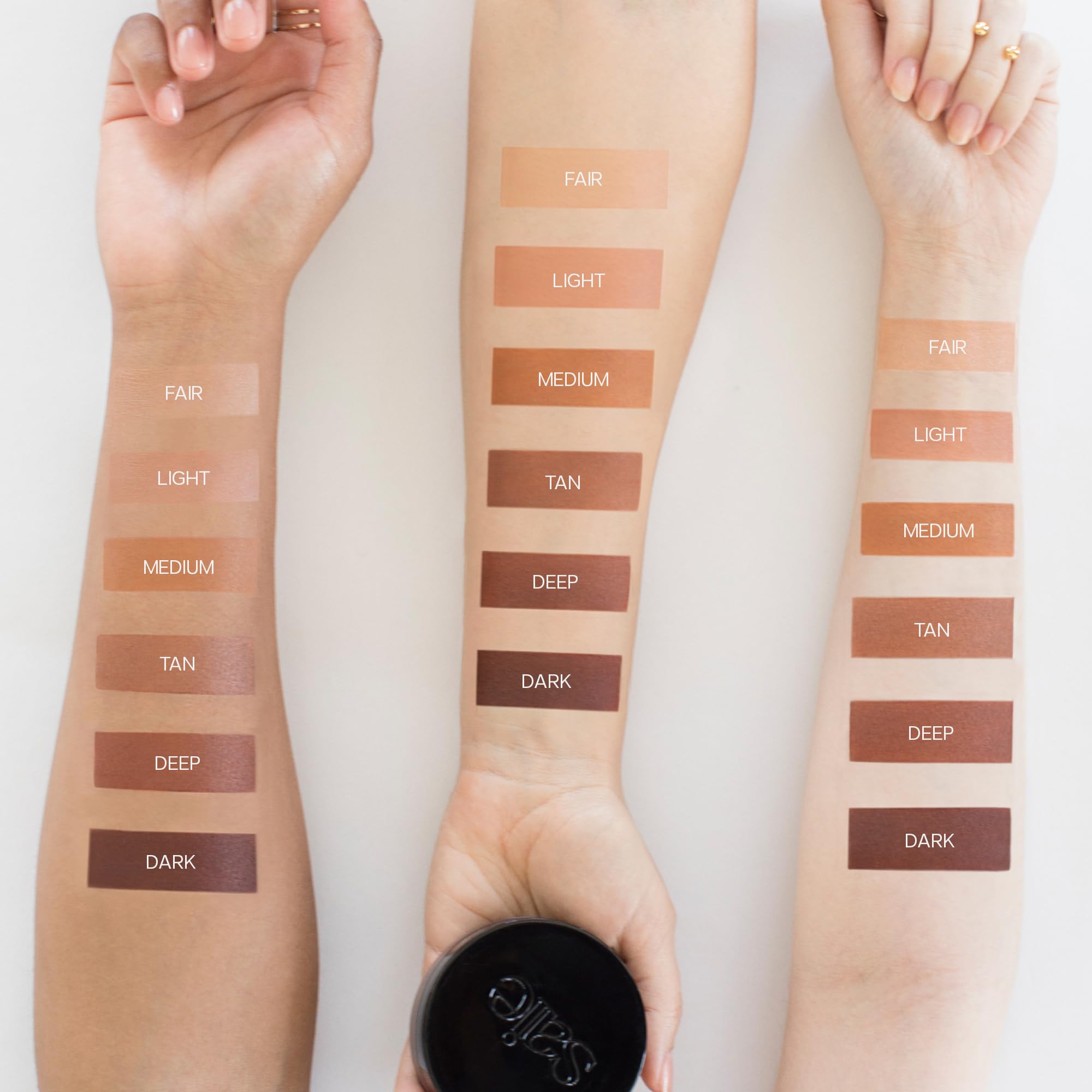 Saie Sun Melt with Vitamin C and nourishing oils for skin-friendly glow.