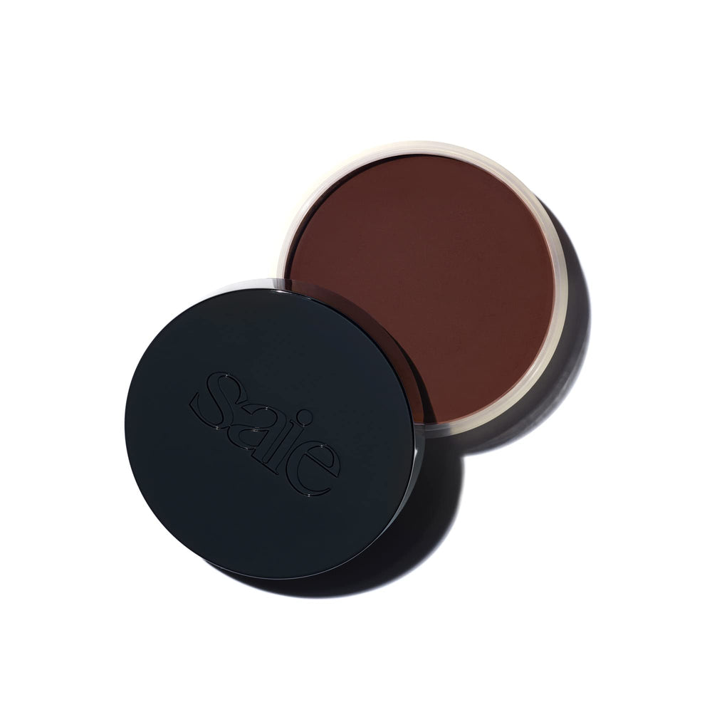 Saie Sun Melt packaging showcases a travel-friendly compact for on-the-go bronzer touch-ups.