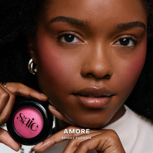 Saie SuperSuede baked blush swatch-on-cheek showing natural flush