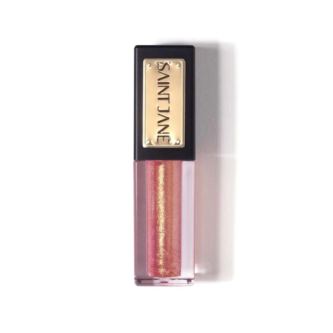 SAINT JANE Nectar lip oil bottle close-up with golden peach shimmer for hydration