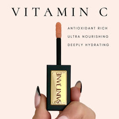 SAINT JANE lip oil on lips demonstrating hydration and shine