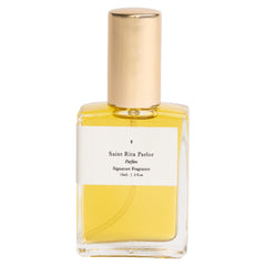Saint Rita Parlor Signature Parfum bottle closeup reveals luxury craftsmanship.