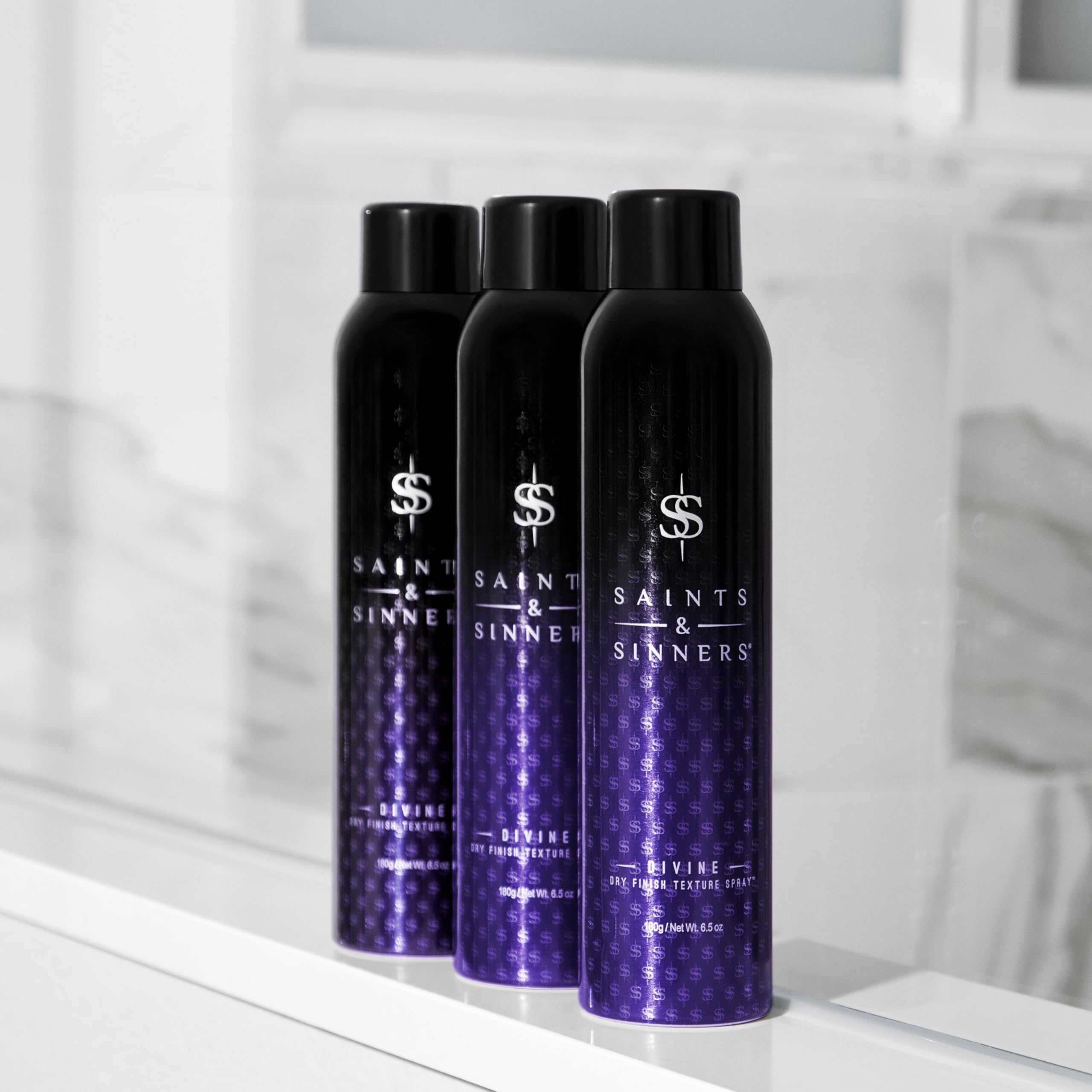 Saints & Sinners Divine Dry Finish Texture Spray provides texture and flexible separation.
