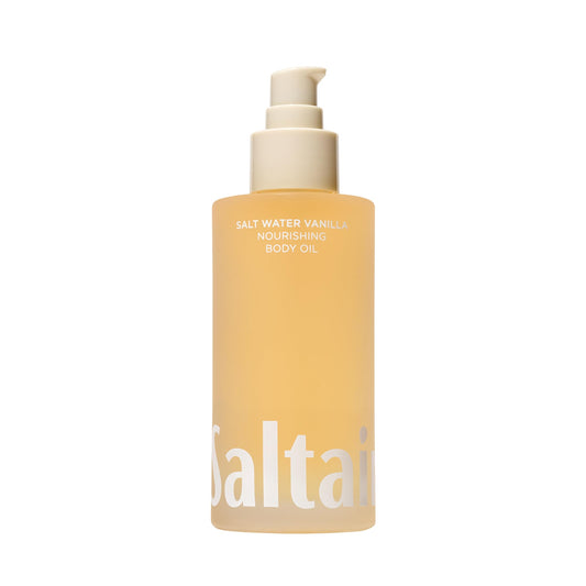 Saltair Body Oil bottle with pump showing vanilla fragrance and silky hydration