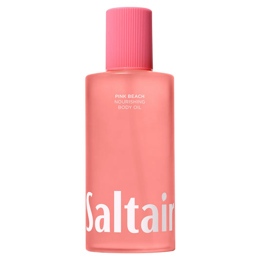 Saltair Pink Beach Body Oil bottle highlights a non-greasy, hydrating formula for daily use.