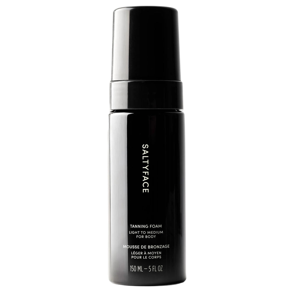 Saltyface tanning foam bottle in light-to-medium shade for an even, transfer-free glow.