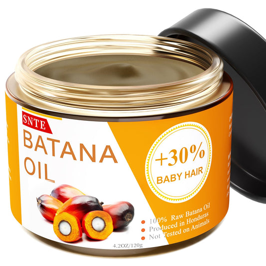 Samnyte Batana Oil bottle on wood surface promotes healthy hair growth