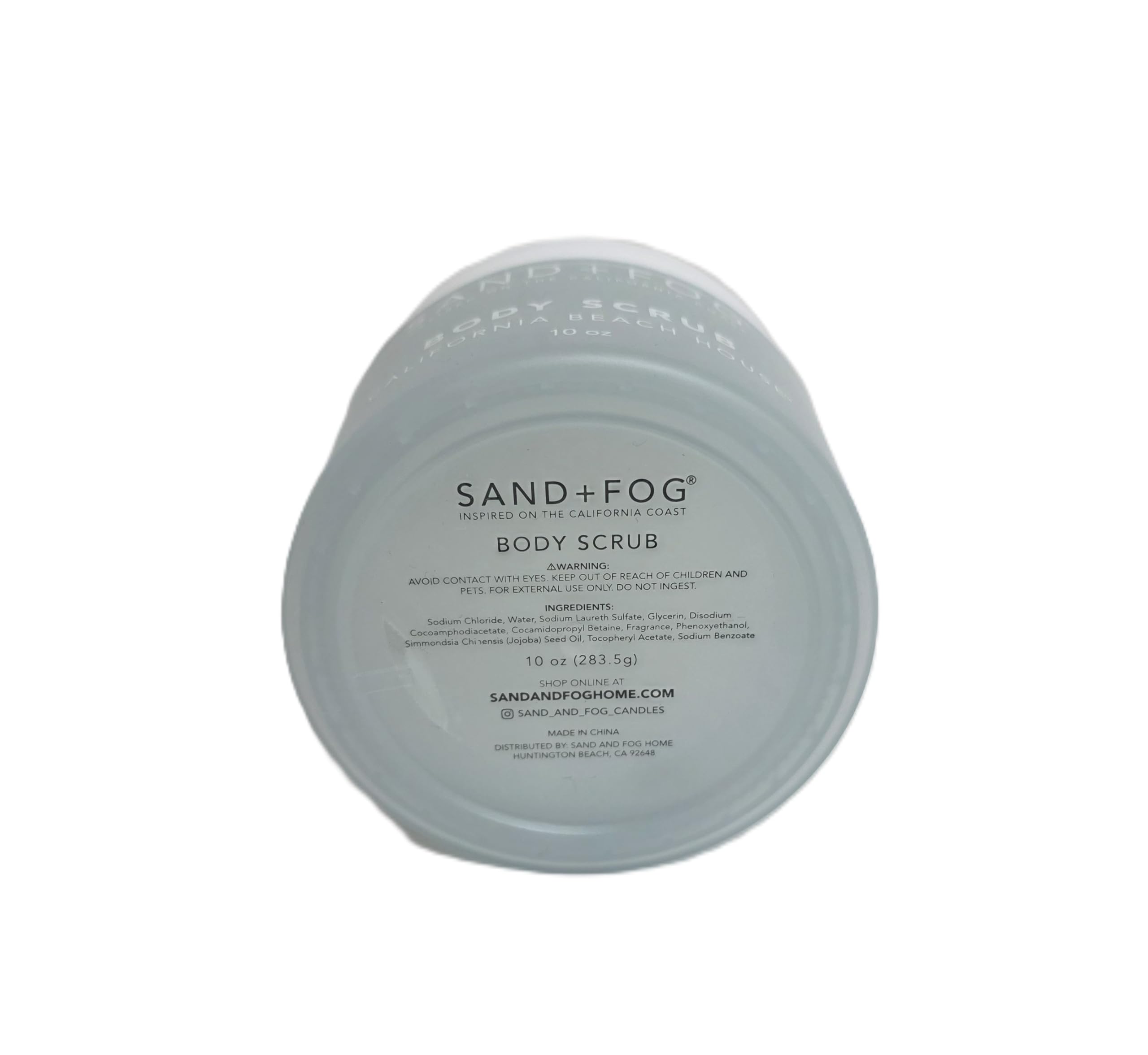 Sand and Fog body scrub texture close-up highlighting nourishing oils.