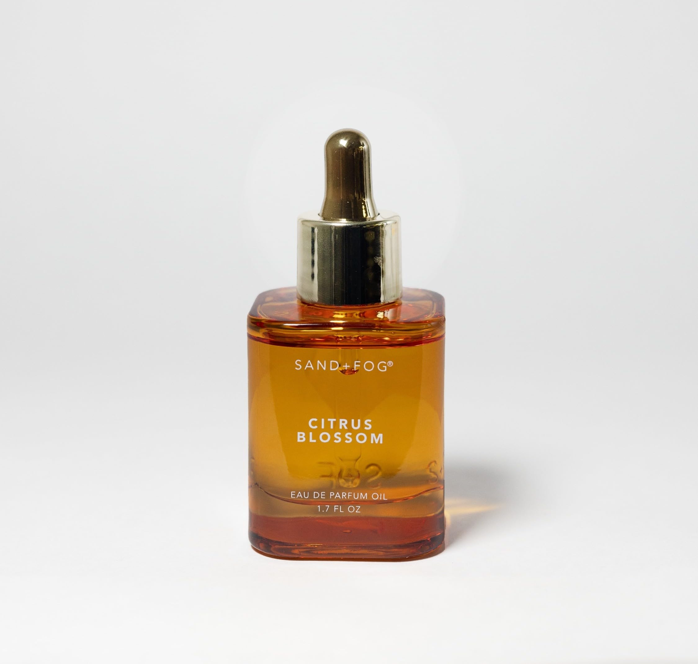 Sand + Fog Citrus Blossom bottle dropper for precise, personal fragrance application.