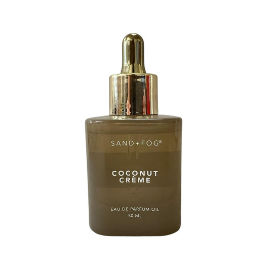 Sand + Fog Coconut Creme EDP Oil bottle pour for long-lasting tropical coconut scent on pulse points