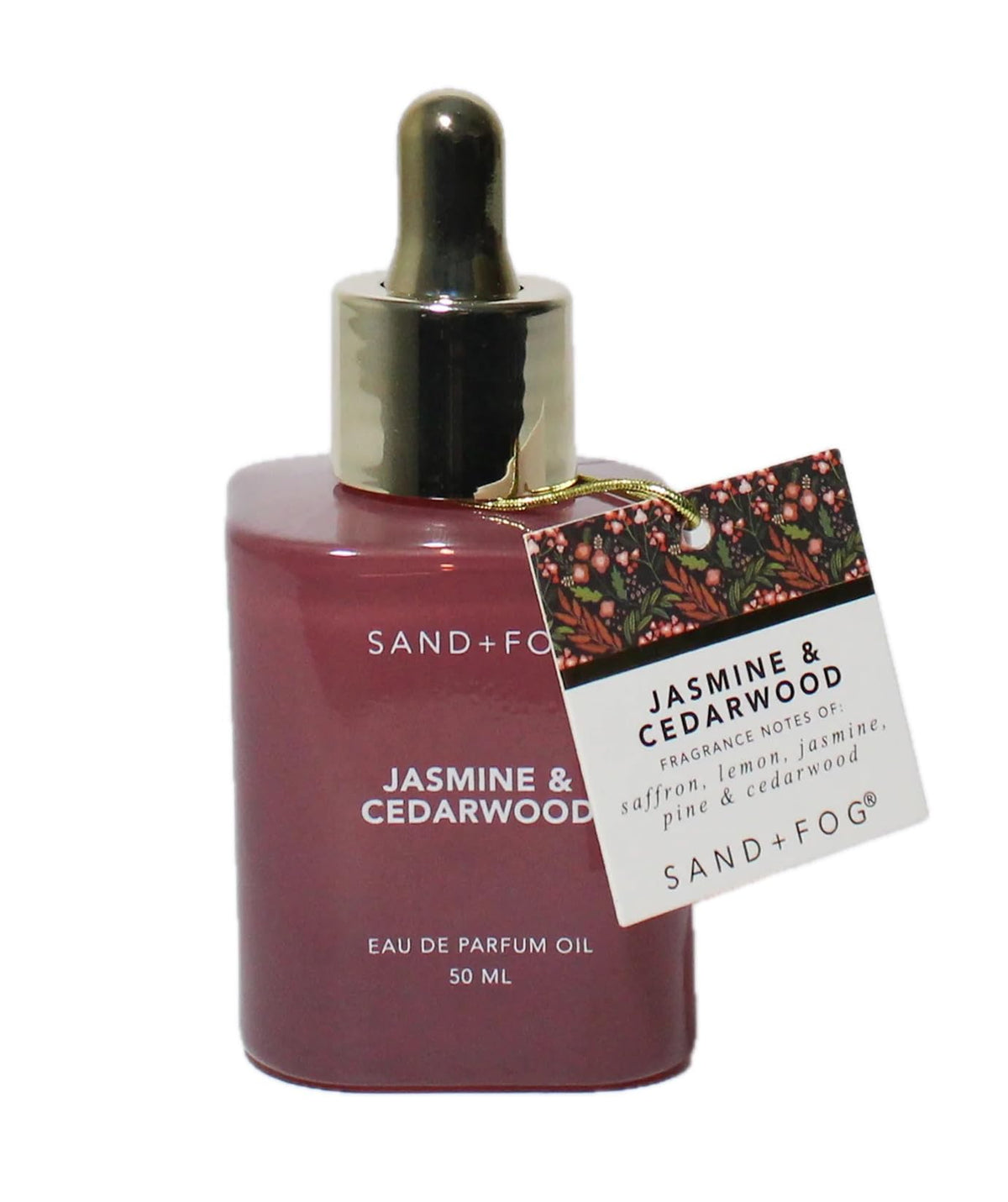 Sand + Fog Jasmine & Cedarwood perfume oil bottle with precise dropper for controlled application.