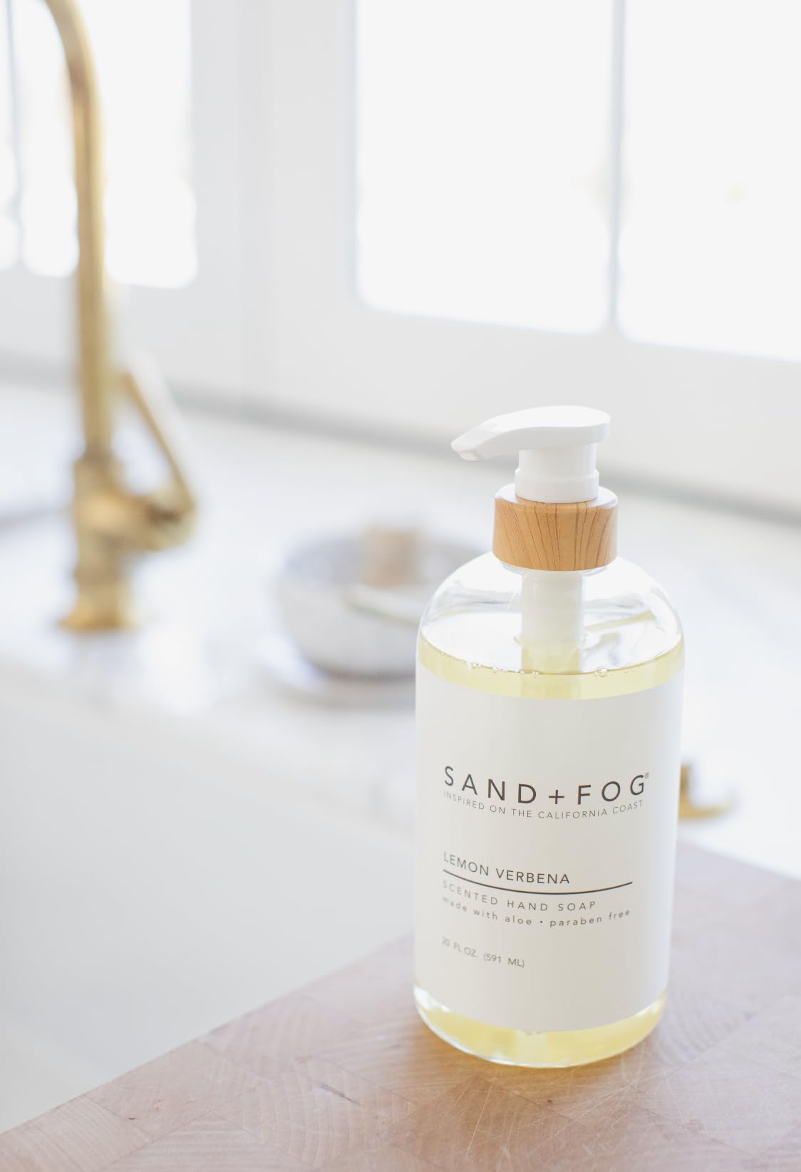 Sand + Fog Lemon Verbena label closeup highlights premium ingredients and branding.