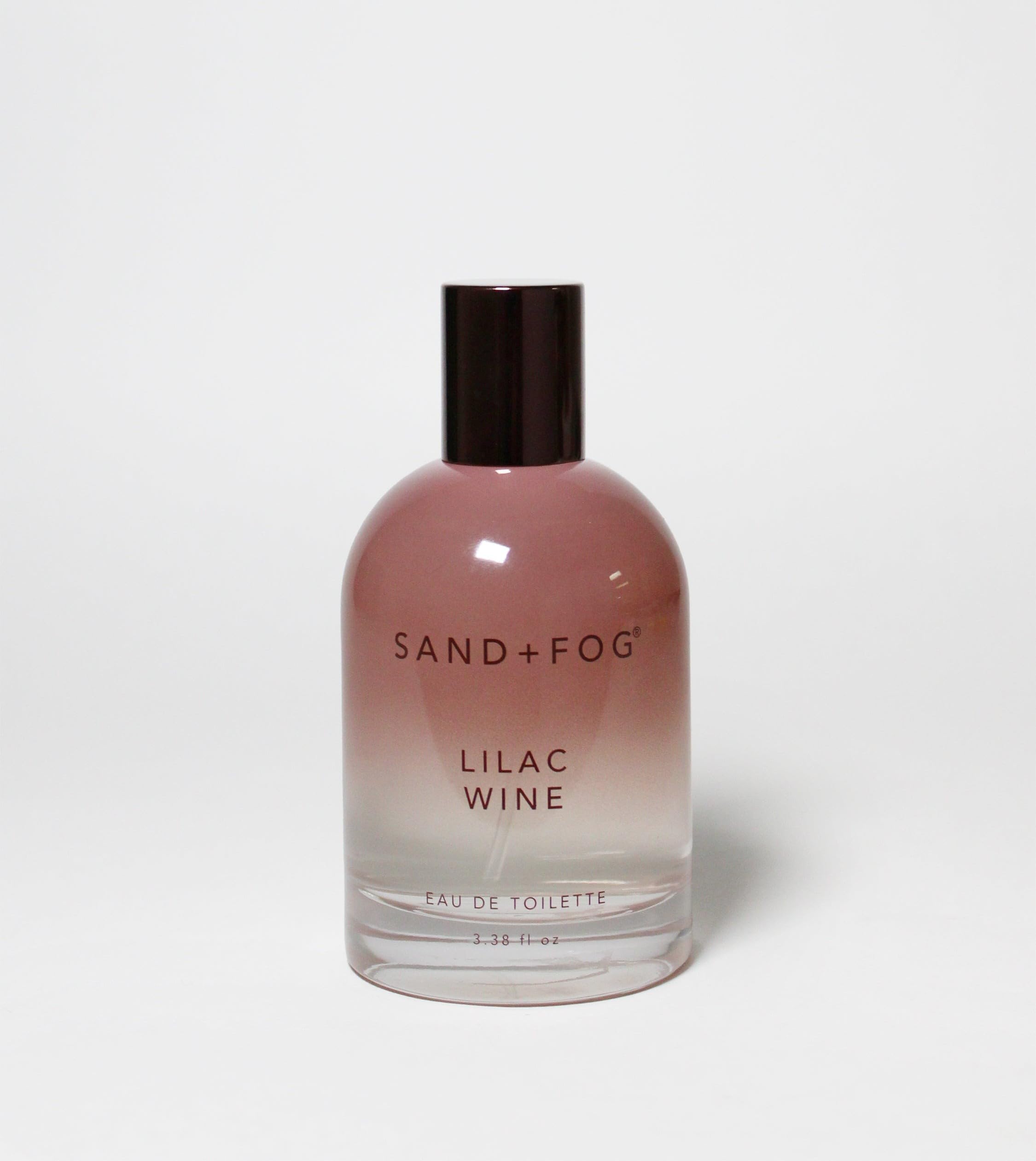 Sand + Fog Lilac Wine EDT bottle with a gradient mauve-to-clear design, ideal for daily wear.