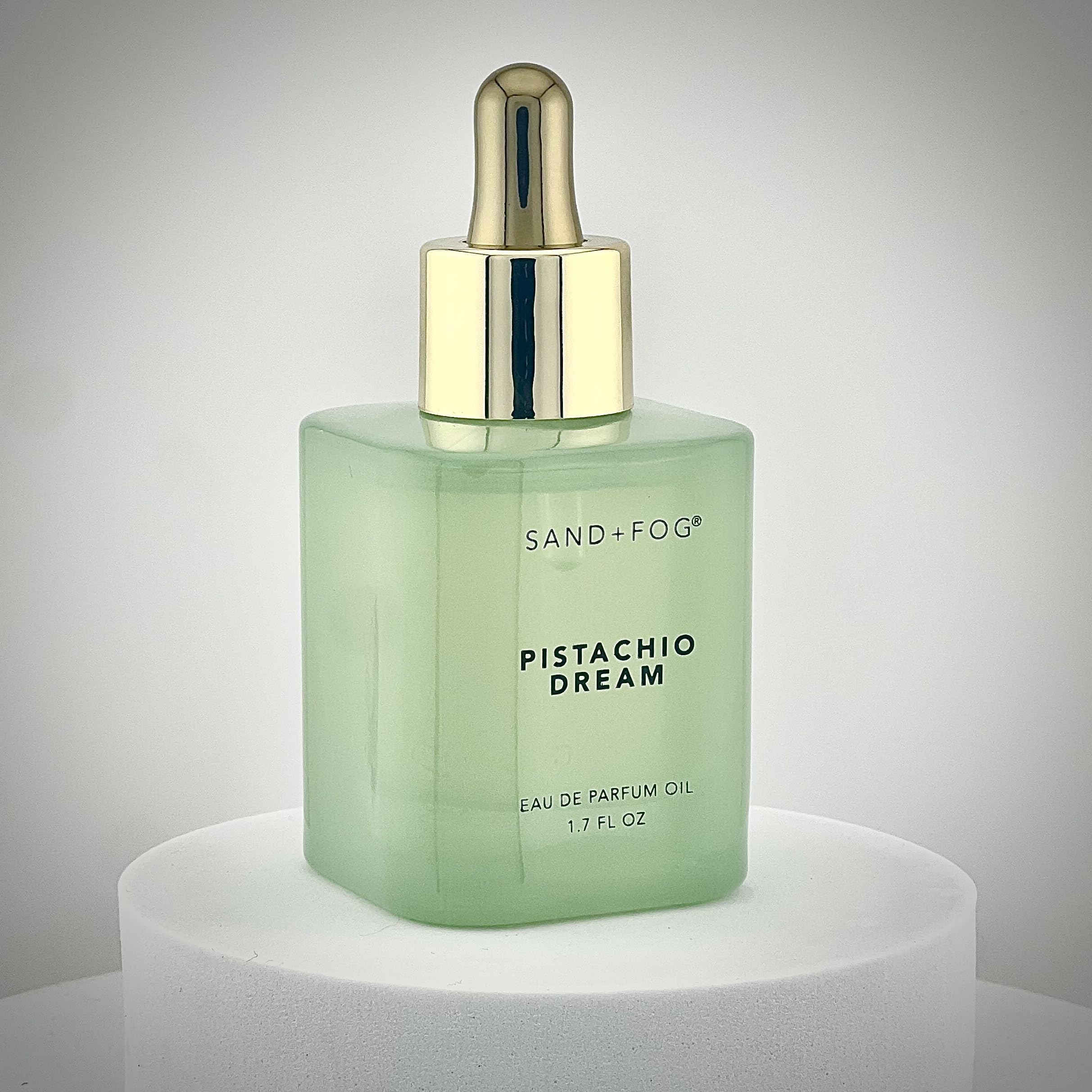 Sand + Fog Pistachio Dream dropper in use for precise, minimal waste fragrance application