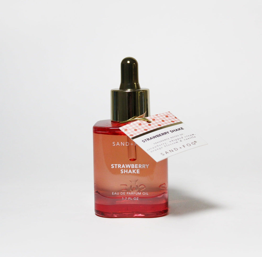 Sand + Fog Strawberry Shake dropper bottle delivering lasting gourmand strawberry cream fragrance