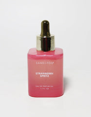 Sand + Fog Strawberry Spritz bottle pour reveals bright opening notes for a refreshing vibe