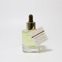 Sand + Fog Vanilla Cake parfum oil dropper ready for targeted, precise application