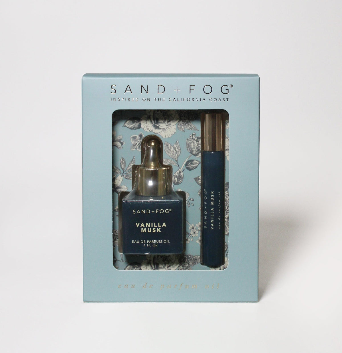 Sand + Fog Vanilla Musk bottle with gold dropper—precise application and lasting scent