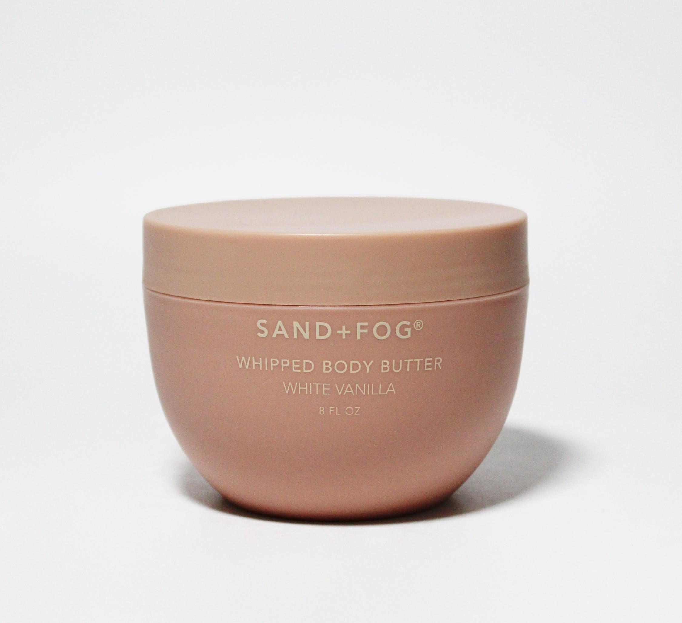Sand + Fog Whipped Body Butter in a rose-gold jar for lasting hydration and subtle vanilla scent