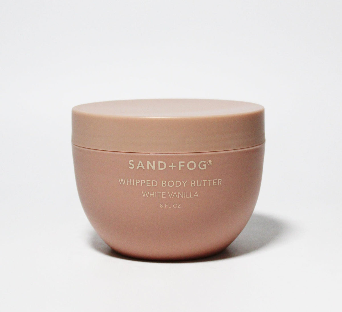 Sand + Fog Whipped Body Butter in a rose-gold jar for lasting hydration and subtle vanilla scent