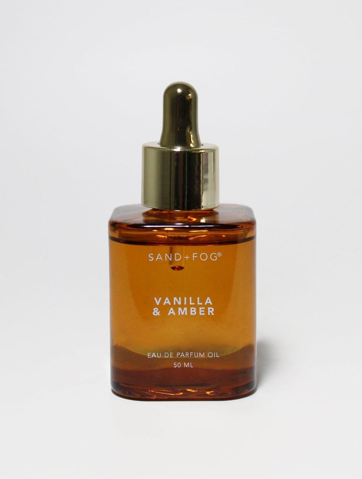Sand Fog Vanilla and Amber EDP Oil bottle, long-lasting daily fragrance.