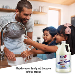Hand under running water with rich lather from Sanit Silky Clean.